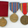Group of three to YN2 Monica Englehart, US Navy